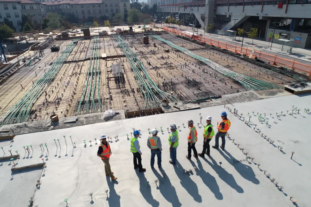 Construction crew lined up on site