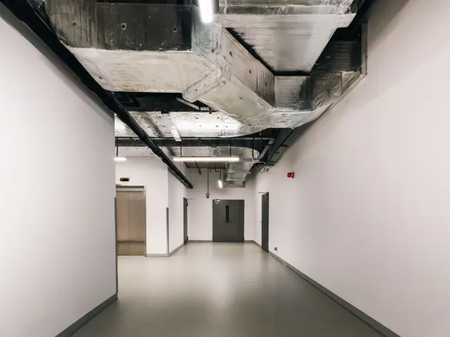 Completed healthcare facility corridor with MEP fit-out