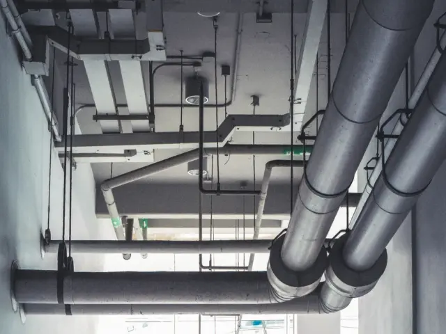 HVAC ductwork installed in a building ceiling