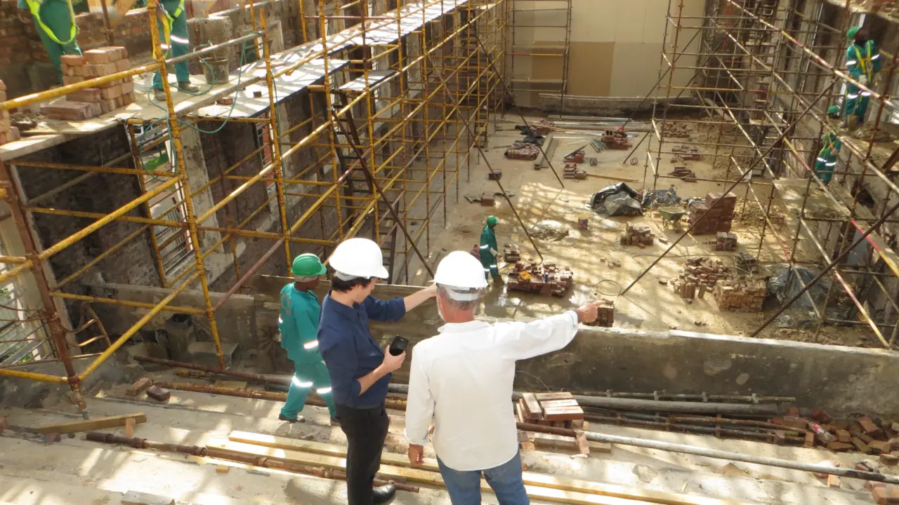 Site supervisors directing technical manpower on schedule