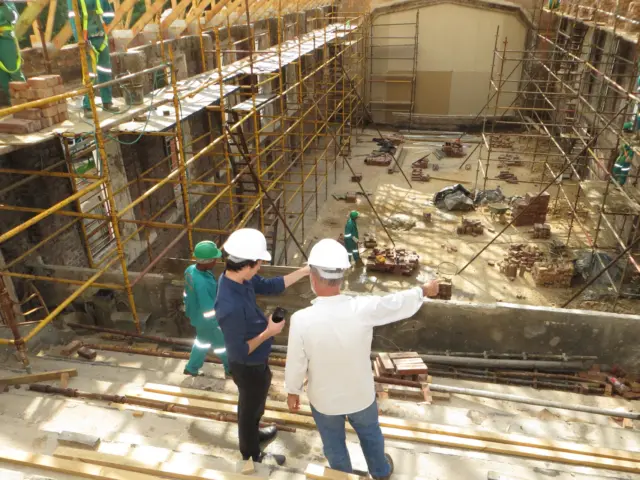 Site supervisors directing technical manpower on schedule